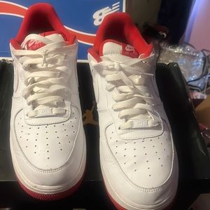 Red and white Nike Air Force ones